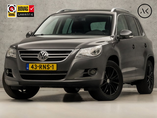 Volkswagen Tiguan - 1.4 TSI Sport&Style 150Pk (NAVIGATIE, CLIMATE, GETINT GLAS, TREKHAAK, SPORTSTOELEN, CRUISE, PARKEERSENSOREN, NIEUWE APK, NIEUWSTAAT)