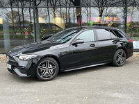 Mercedes-Benz C-Klasse - 300e AMG Estate // Trekhaak // Panoramadak // Distronic // 360 Camera // Memory // Sfeerverlichting