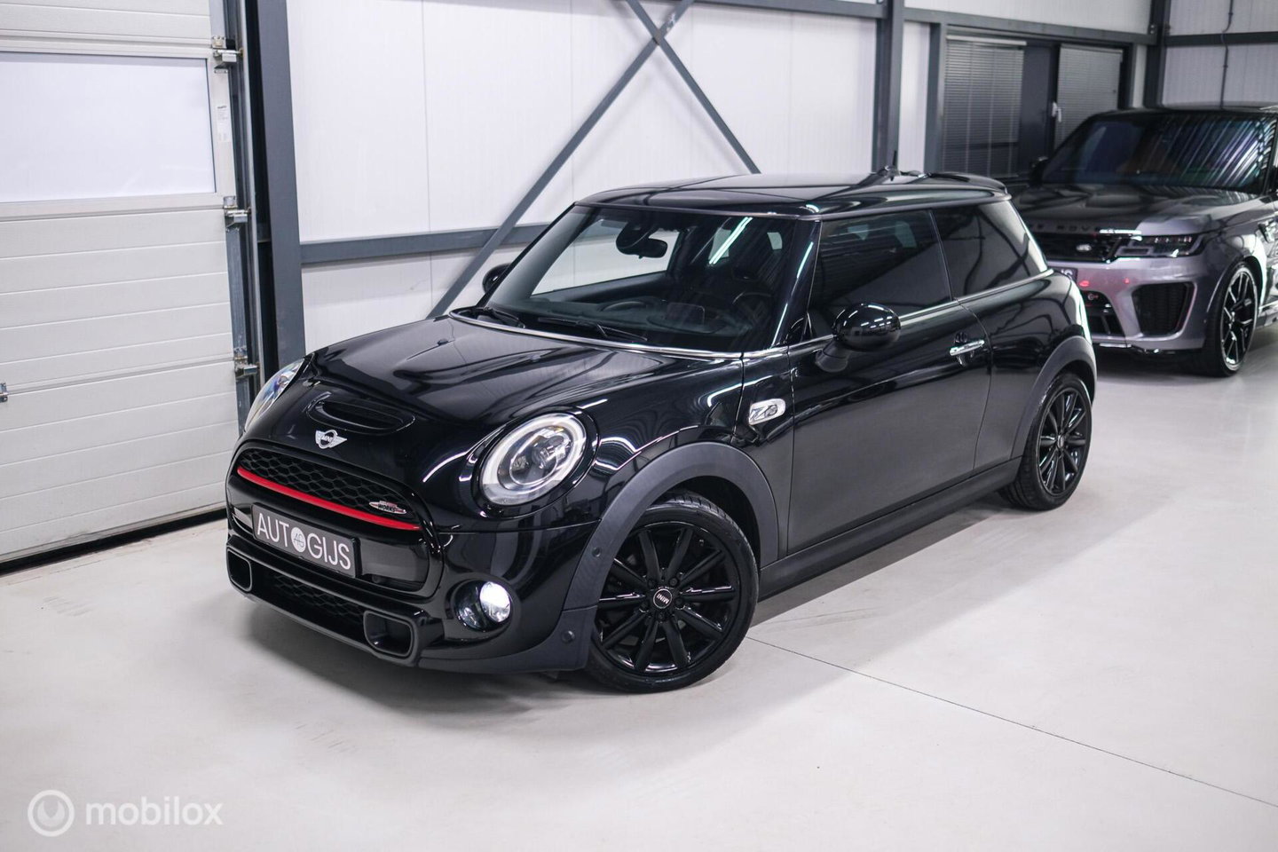 MINI Mini 2.0 Cooper S JCW Package | Kuipstoelen | JCW exhaust | Camera | Adaptive cruise | HUD | Xenon | Flippers |