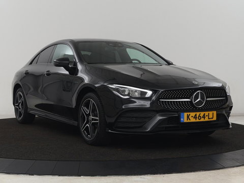 Mercedes-Benz CLA-Klasse 250e AMG | SOH 98% | Stoelverwarming | Widescreen | Sfeerverlichting | Full LED | Park Assist | Camera | Navigatie | Half leder | PHEV | Plug In