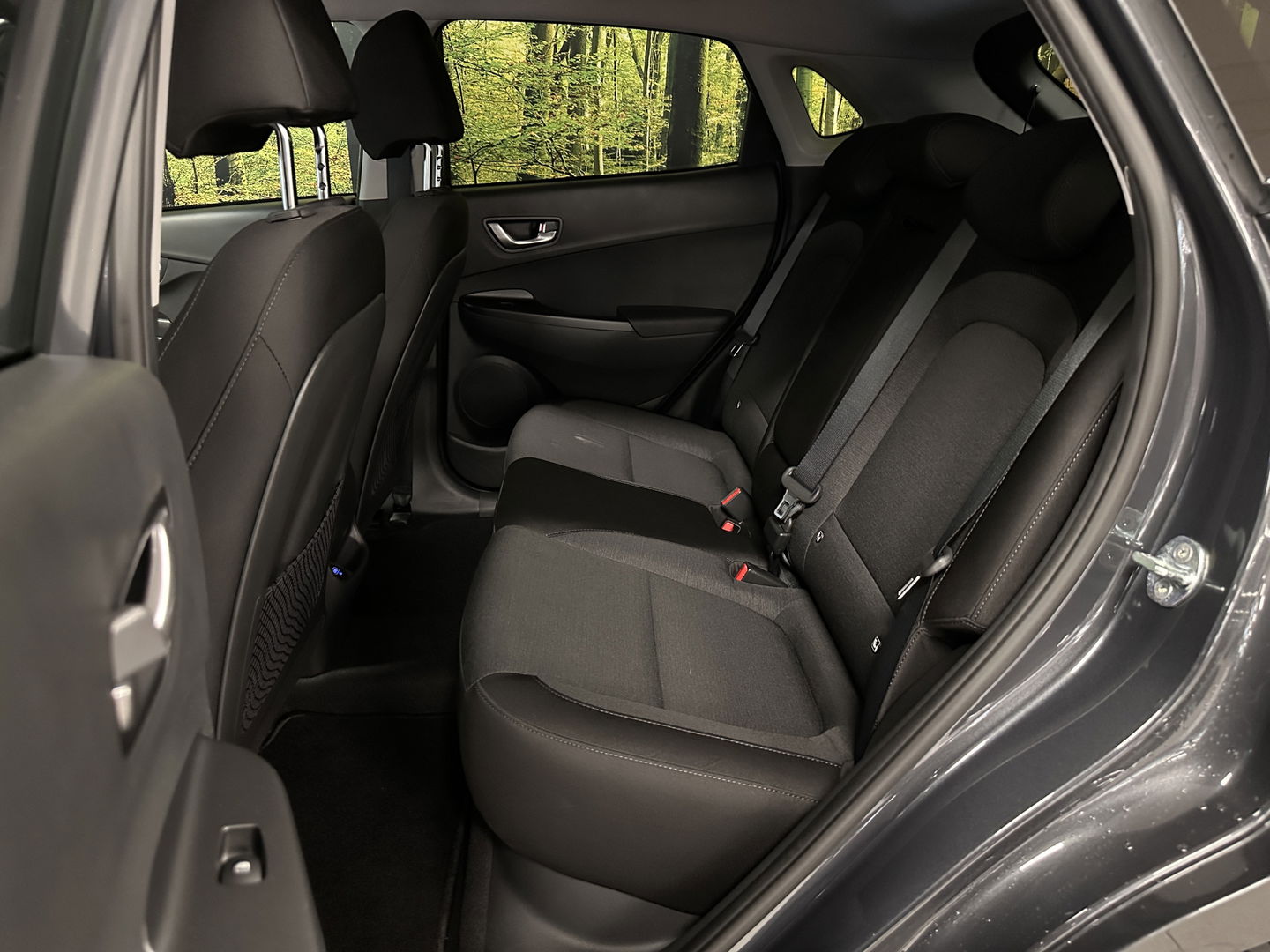 Hyundai KONA EV Comfort Smart 39 kWh | SOH 100% | Parkeersensoren | Cruise Control | Achteruitrijcamera | Apple Carplay | Android Auto | Stoel/Stuurverwarming | Keyless | DAB | Airconditioning