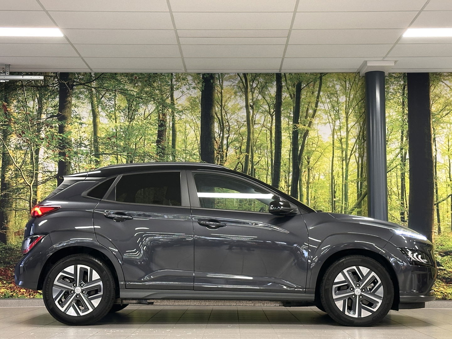 Hyundai KONA EV Comfort Smart 39 kWh | SOH 100% | Parkeersensoren | Cruise Control | Achteruitrijcamera | Apple Carplay | Android Auto | Stoel/Stuurverwarming | Keyless | DAB | Airconditioning