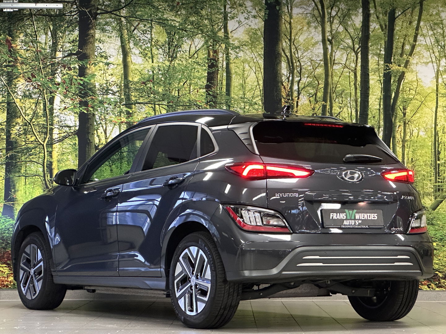 Hyundai KONA EV Comfort Smart 39 kWh | SOH 100% | Parkeersensoren | Cruise Control | Achteruitrijcamera | Apple Carplay | Android Auto | Stoel/Stuurverwarming | Keyless | DAB | Airconditioning