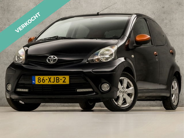 Toyota Aygo - 1.0 VVT-i Dynamic Orange (5 DEURS, GETINT GLAS, AIRCO, TOERENTELLER, ELEK RAMEN, LM VELGEN, NIEUWSTAAT)