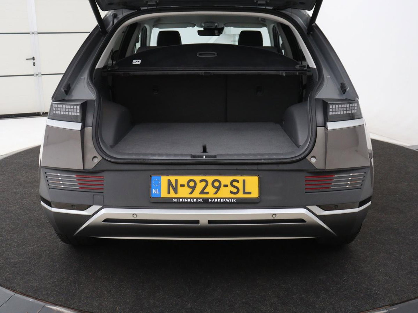 Hyundai IONIQ 5 Connect 58 kWh | SOH 91% | Warmtepomp | Stoelverwarming | Adaptive cruise | Bose Sound | Camera | Carplay | Half leder | Vehicle-to-load | Keyless | Navigatie | Full LED