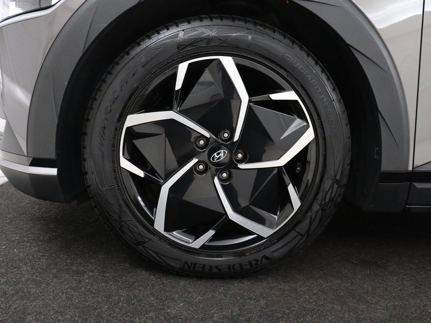 Hyundai IONIQ 5 Connect 58 kWh | SOH 91% | Warmtepomp | Stoelverwarming | Adaptive cruise | Bose Sound | Camera | Carplay | Half leder | Vehicle-to-load | Keyless | Navigatie | Full LED