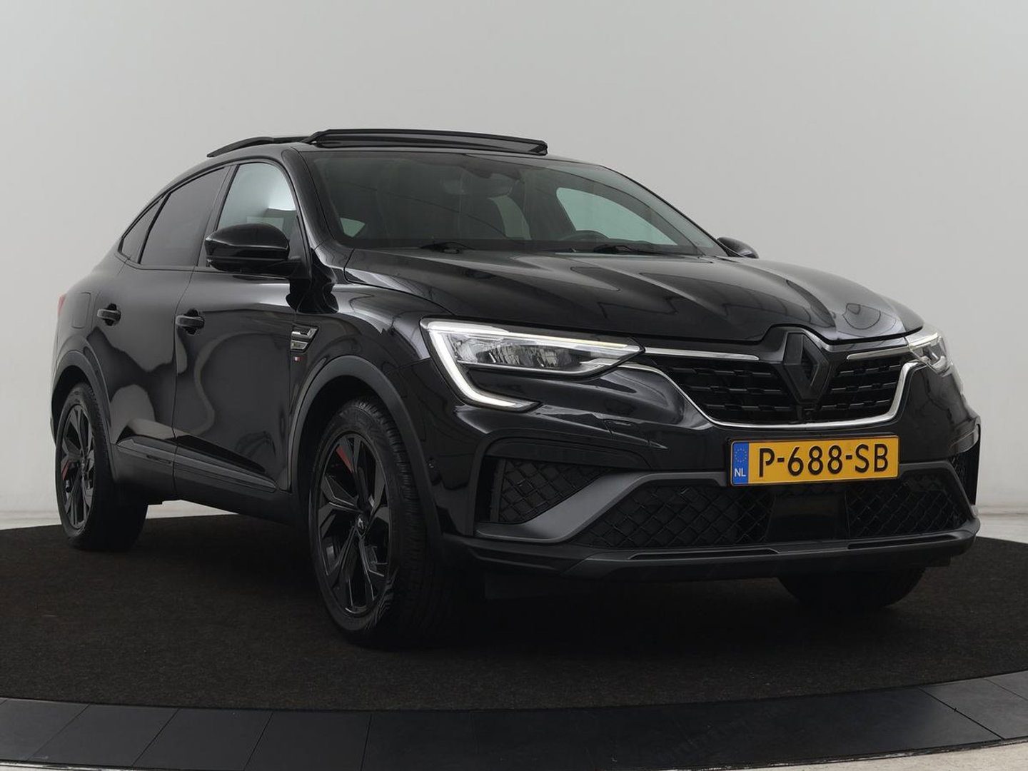 Renault Arkana 1.6 E-Tech Hybrid 145 R.S. Line | Panoramadak | Leder/Alcantara | Trekhaak | Stoelverwarming | Adaptive cruise | Camera | Carplay | Keyless | Park Assist | Full LED | Navigatie