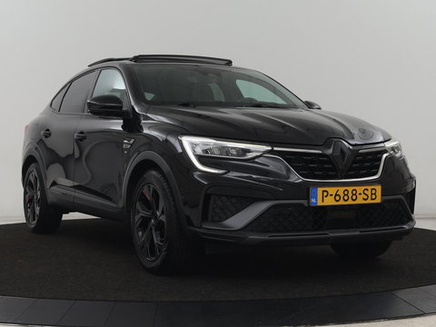 Renault Arkana 1.6 E-Tech Hybrid 145 R.S. Line | Panoramadak | Leder/Alcantara | Trekhaak | Stoelverwarming | Adaptive cruise | Camera | Carplay | Keyless | Park Assist | Full LED | Navigatie