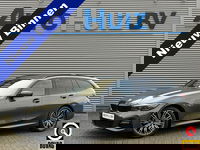 BMW 3 Serie - Touring 320e M Sport Laser Licht Trekhaak Stuurwielverwarming Carplay Achteruitrijcamera Keyless Entry