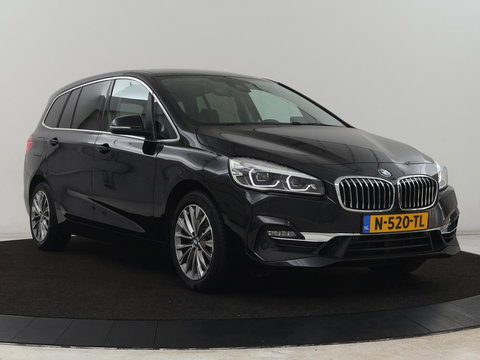 BMW 2 Serie Gran Tourer 220i Business Edition Plus | Luxury Line | Leder | Head-Up | Stoelverwarming | Trekhaak | Camera | Carplay | Full LED | Keyless | Navigatie | Cruise control | Bluetooth