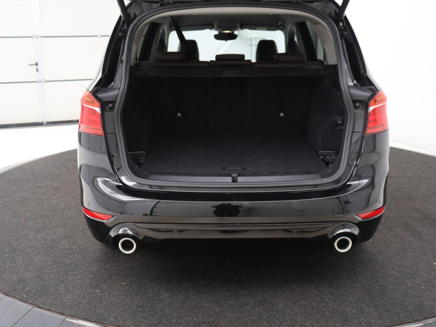 BMW 2 Serie Gran Tourer 220i Business Edition Plus | Luxury Line | Leder | Head-Up | Stoelverwarming | Trekhaak | Camera | Carplay | Full LED | Keyless | Navigatie | Cruise control | Bluetooth