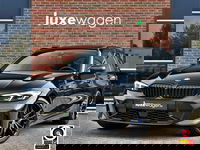 BMW 3 Serie - Touring 330e xDrive M-Sport Pro Pano M-zetels ACC HUD 19inch