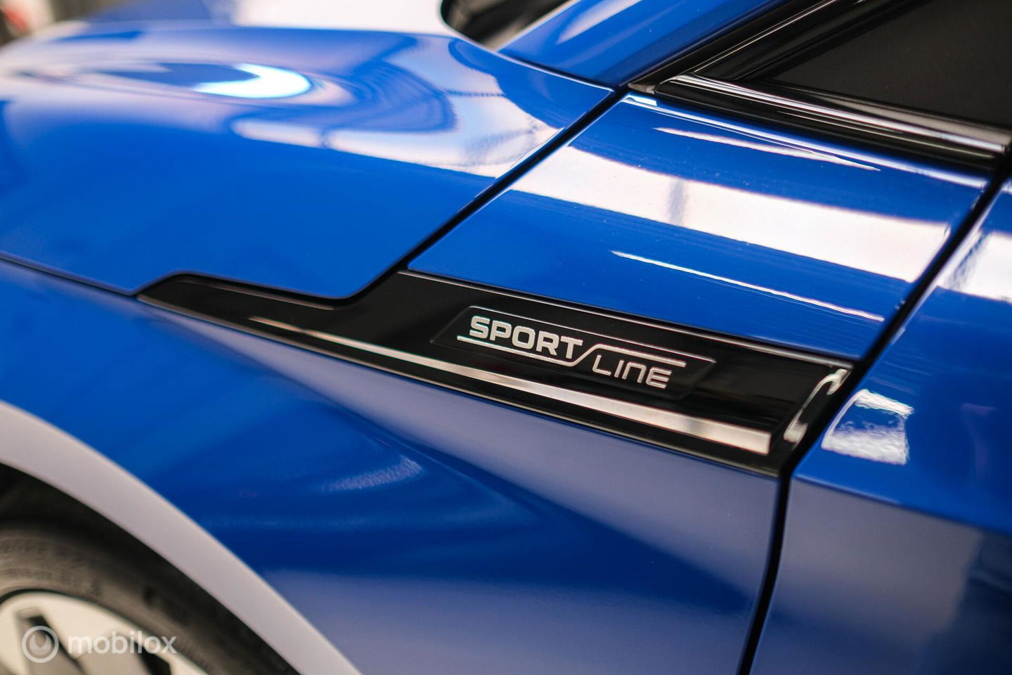 Škoda Enyaq iV 60 Sportline | Sportstoelen | Alcantara | Camera | NL auto | 1e eigenaar | Energy Blue | LED | Rijklaarprijs |