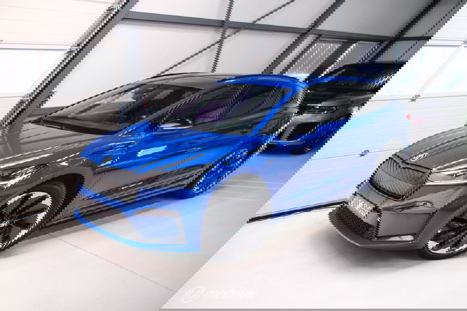 Škoda Enyaq iV 60 Sportline | Sportstoelen | Alcantara | Camera | NL auto | 1e eigenaar | Energy Blue | LED | Rijklaarprijs |