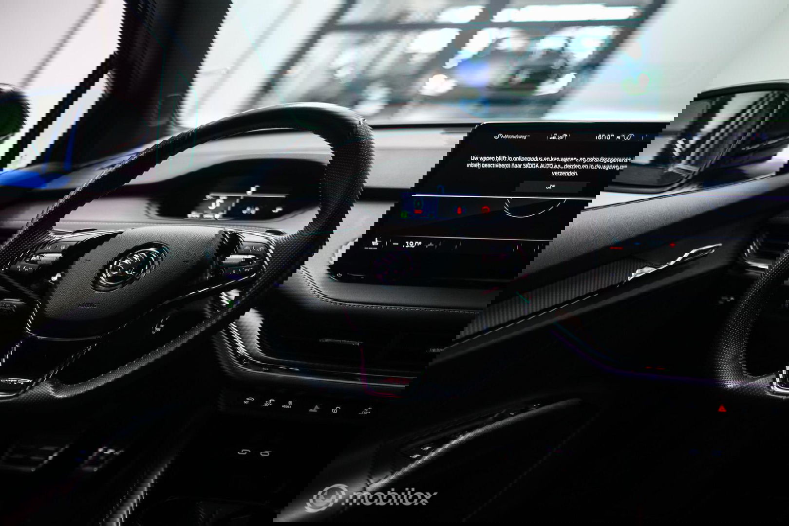 Škoda Enyaq iV 60 Sportline | Sportstoelen | Alcantara | Camera | NL auto | 1e eigenaar | Energy Blue | LED | Rijklaarprijs |