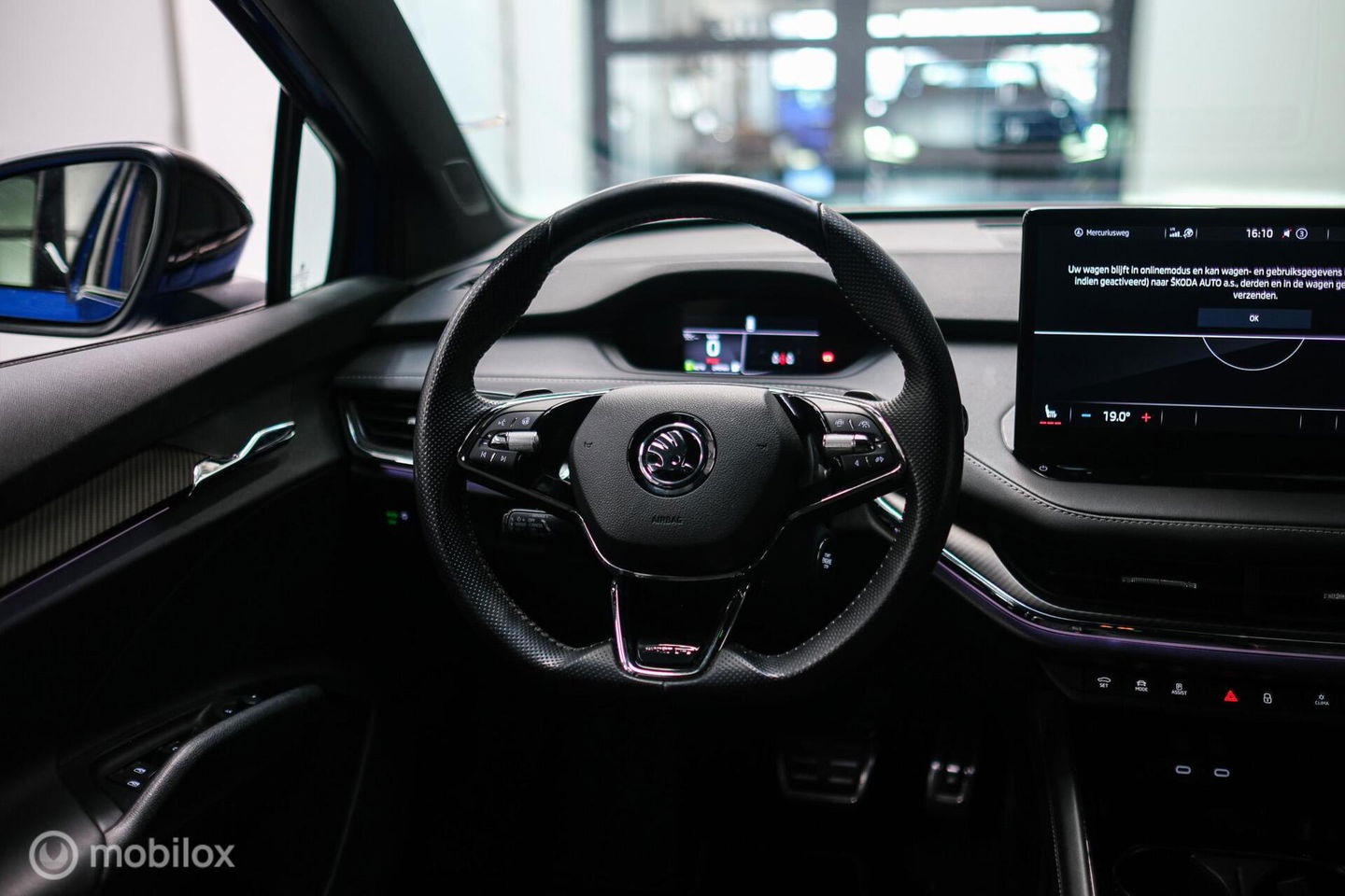 Škoda Enyaq iV 60 Sportline | Sportstoelen | Alcantara | Camera | NL auto | 1e eigenaar | Energy Blue | LED | Rijklaarprijs |