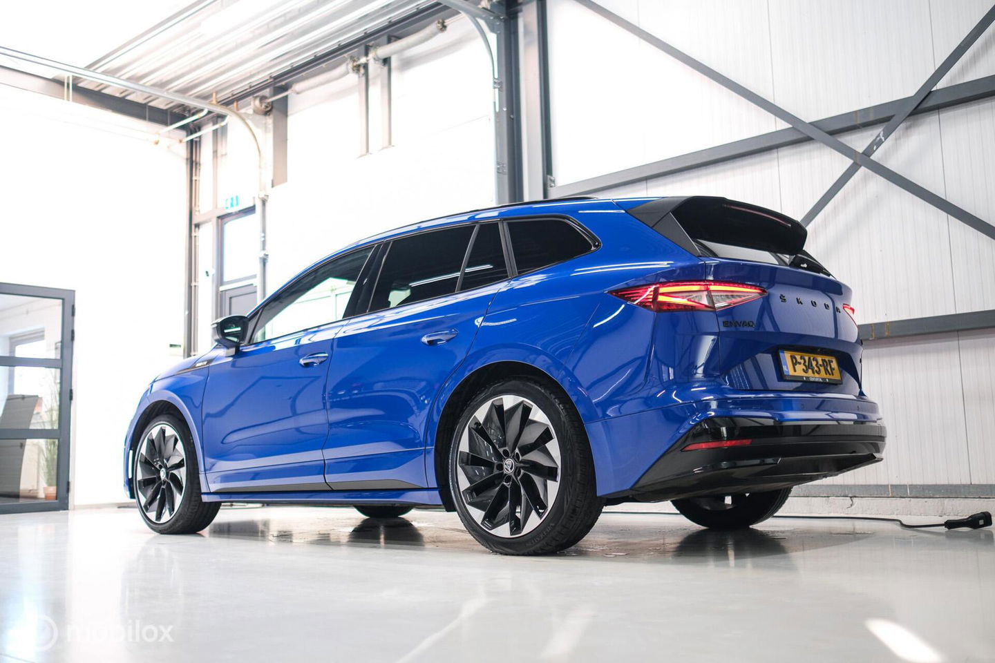 Škoda Enyaq iV 60 Sportline | Sportstoelen | Alcantara | Camera | NL auto | 1e eigenaar | Energy Blue | LED | Rijklaarprijs |