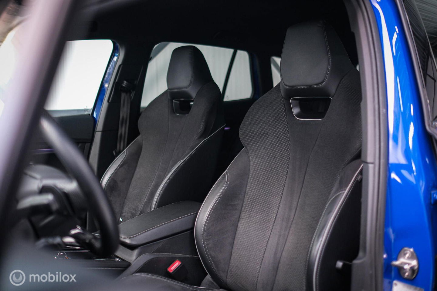 Škoda Enyaq iV 60 Sportline | Sportstoelen | Alcantara | Camera | NL auto | 1e eigenaar | Energy Blue | LED | Rijklaarprijs |