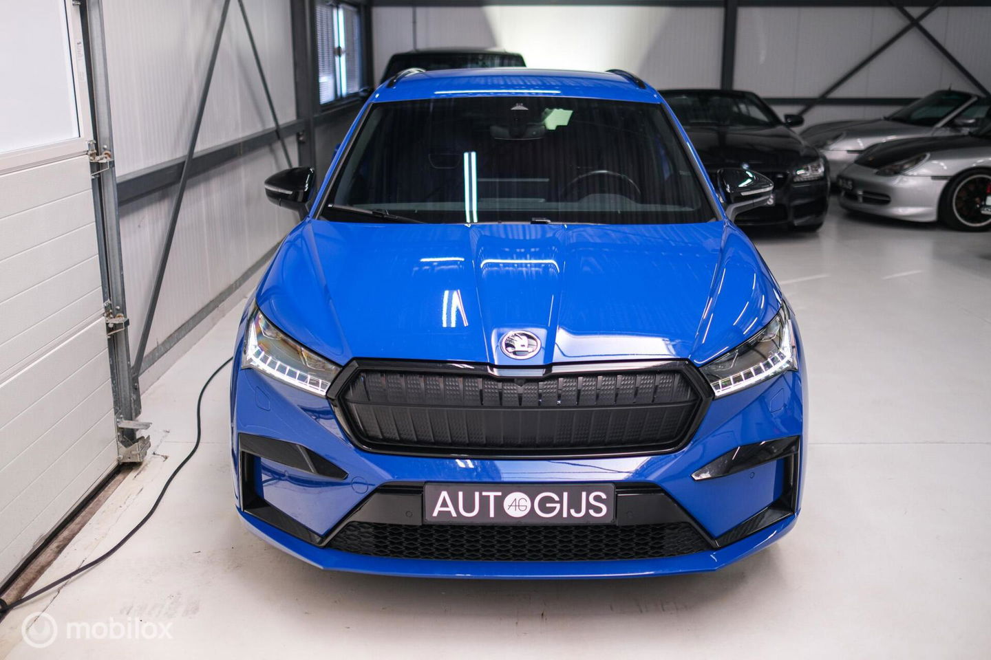 Škoda Enyaq iV 60 Sportline | Sportstoelen | Alcantara | Camera | NL auto | 1e eigenaar | Energy Blue | LED | Rijklaarprijs |