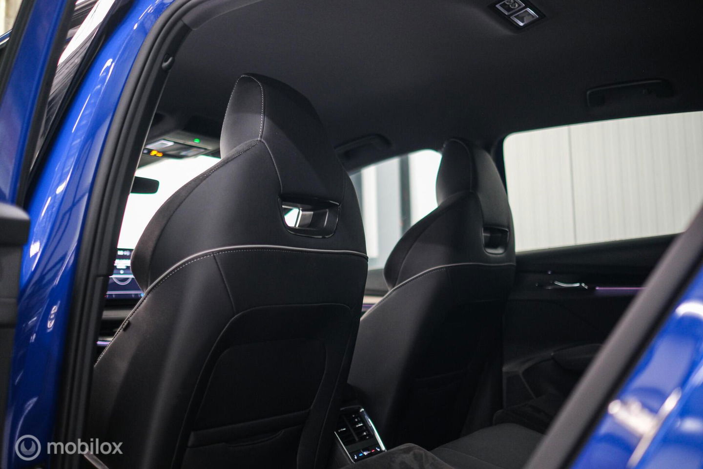 Škoda Enyaq iV 60 Sportline | Sportstoelen | Alcantara | Camera | NL auto | 1e eigenaar | Energy Blue | LED | Rijklaarprijs |