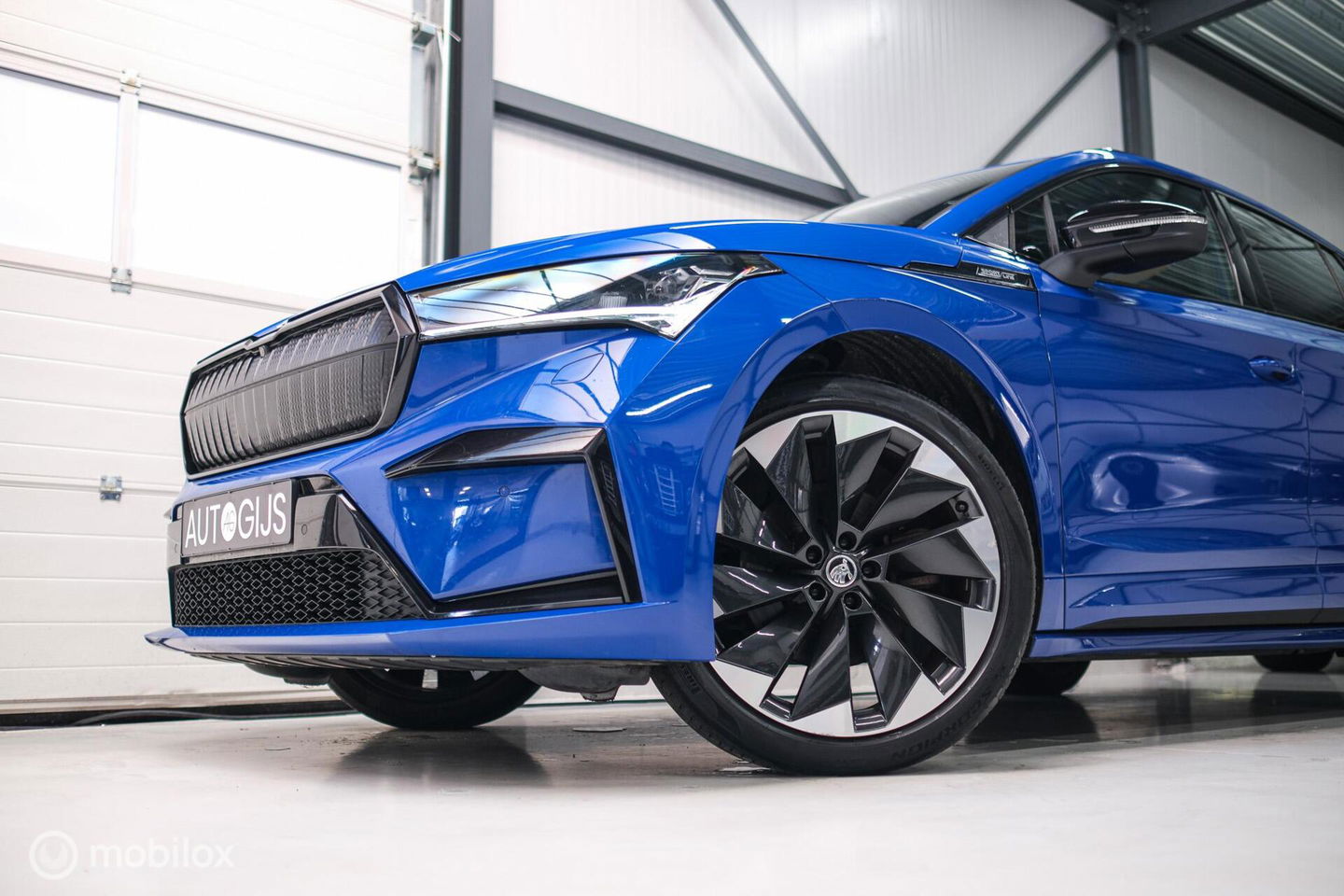 Škoda Enyaq iV 60 Sportline | Sportstoelen | Alcantara | Camera | NL auto | 1e eigenaar | Energy Blue | LED | Rijklaarprijs |
