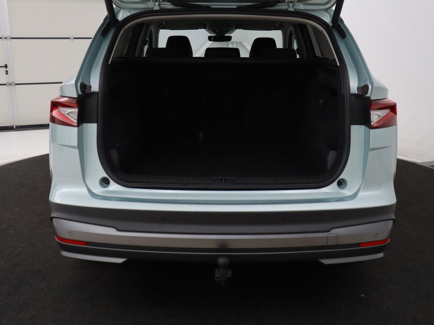 Škoda Enyaq iV 60 | SOH 91% | Trekhaak | Stoelverwarming | Camera | Sportstuur | Carplay | Navigatie | Cruise control | Full LED | Half leder | DAB | Parkeerhulp | Sfeerverlichting | Climate control