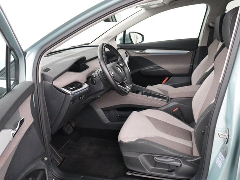 Škoda Enyaq iV 60 | SOH 91% | Trekhaak | Stoelverwarming | Camera | Sportstuur | Carplay | Navigatie | Cruise control | Full LED | Half leder | DAB | Parkeerhulp | Sfeerverlichting | Climate control