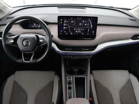 Škoda Enyaq iV 60 | SOH 91% | Trekhaak | Stoelverwarming | Camera | Sportstuur | Carplay | Navigatie | Cruise control | Full LED | Half leder | DAB | Parkeerhulp | Sfeerverlichting | Climate control