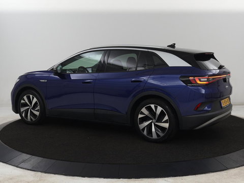 Volkswagen ID.4 First 77 kWh | SOH 90% | Stoel & stuurverwarming | Adaptive cruise | Camera | Carplay | Half leder | Navigatie | 20'' | Full LED | Keyless | Climate control | Sfeerverlichting