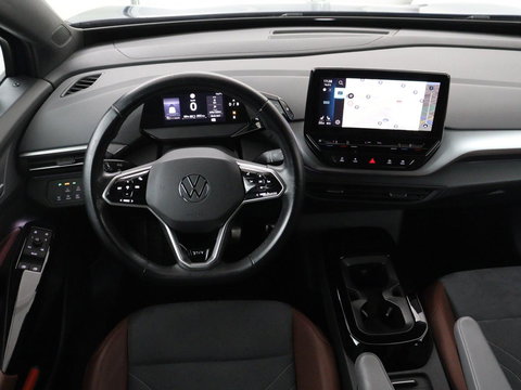 Volkswagen ID.4 First 77 kWh | SOH 90% | Stoel & stuurverwarming | Adaptive cruise | Camera | Carplay | Half leder | Navigatie | 20'' | Full LED | Keyless | Climate control | Sfeerverlichting