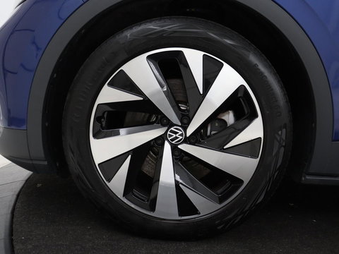 Volkswagen ID.4 First 77 kWh | SOH 90% | Stoel & stuurverwarming | Adaptive cruise | Camera | Carplay | Half leder | Navigatie | 20'' | Full LED | Keyless | Climate control | Sfeerverlichting