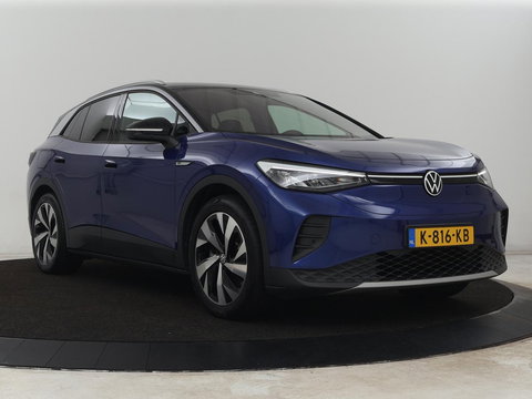 Volkswagen ID.4 First 77 kWh | SOH 90% | Stoel & stuurverwarming | Adaptive cruise | Camera | Carplay | Half leder | Navigatie | 20'' | Full LED | Keyless | Climate control | Sfeerverlichting