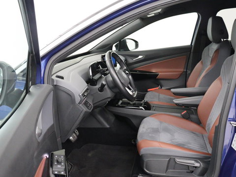 Volkswagen ID.4 First 77 kWh | SOH 90% | Stoel & stuurverwarming | Adaptive cruise | Camera | Carplay | Half leder | Navigatie | 20'' | Full LED | Keyless | Climate control | Sfeerverlichting