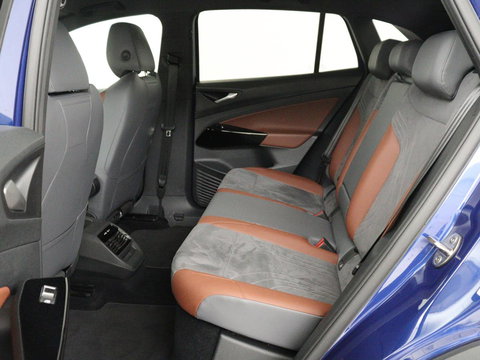Volkswagen ID.4 First 77 kWh | SOH 90% | Stoel & stuurverwarming | Adaptive cruise | Camera | Carplay | Half leder | Navigatie | 20'' | Full LED | Keyless | Climate control | Sfeerverlichting