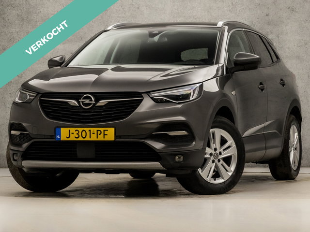 Opel Grandland X - 1.2 Turbo Sport Automaat (APPLE CARPLAY, GROOT NAVI, LANE ASSIST, LEDER, CAMERA, LED KOPLAMPEN, SPORTSTOELEN, GETINT GLAS, CRUISE, NIEUWE APK, NIEUWSTAAT)