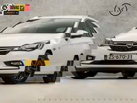 Opel Astra - Sports Tourer 1.0 Turbo 120 Jaar Edition (APPLE CARPLAY, NAVIGATIE, CLIMATE, LED KOPLAMPEN, SPORTSTOELEN, CRUISE, PARKEERSENSOREN, GETINT GLAS, LM VELGEN, NIEUWSTAAT)
