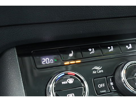 Škoda Karoq 1.5 TSI ACT Style DSG | Navi | Adapt. Cruise | Camera | Keyless | All Season | Apple CarPlay | Stoelverw.