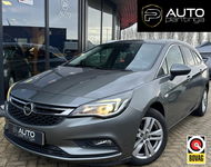 Opel Astra - Sports Tourer 1.4 Turbo 120 Jaar Edition 150PK | AUTOMAAT | ZEER NETTE STAAT | Trekhaak | Stoel en Stuur Verwarming | APK tot 29-04-2027 |