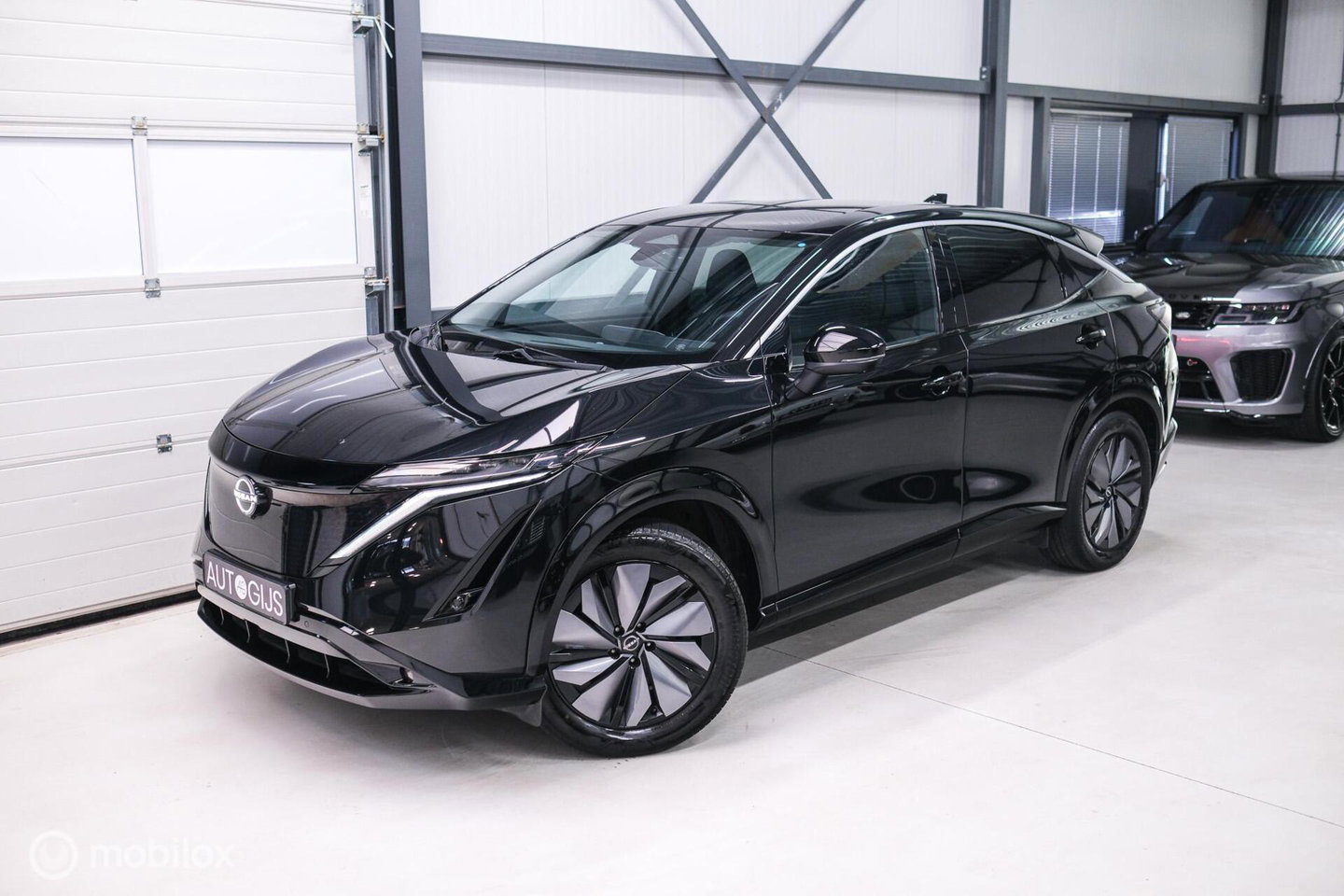 Nissan ARIYA Advance 66 kWh | 360 camera | navigatie | Halfleder | NAP NL auto | Rijklaarprijs | stoelverwarming |