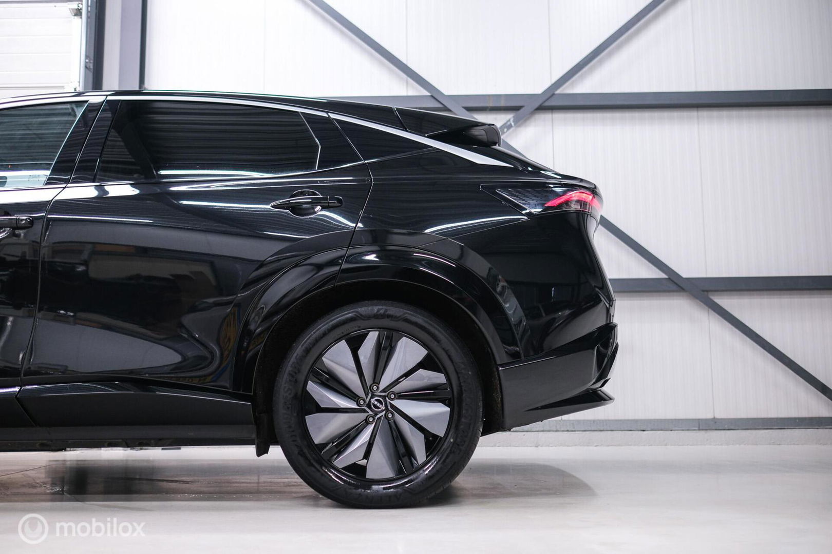 Nissan ARIYA Advance 66 kWh | 360 camera | navigatie | Halfleder | NAP NL auto | Rijklaarprijs | stoelverwarming |