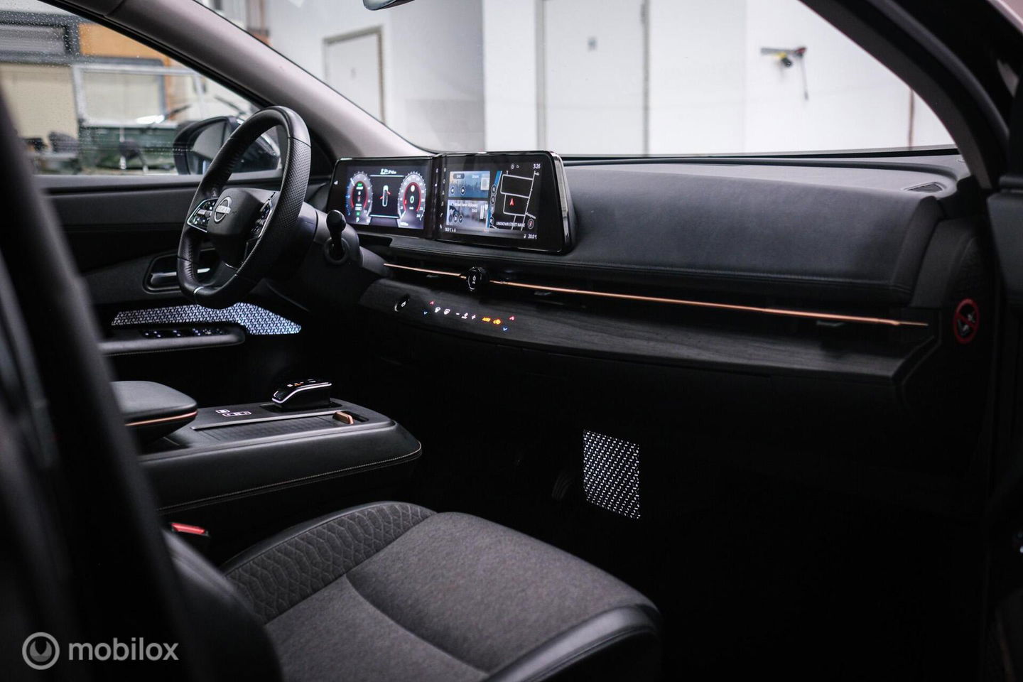 Nissan ARIYA Advance 66 kWh | 360 camera | navigatie | Halfleder | NAP NL auto | Rijklaarprijs | stoelverwarming |