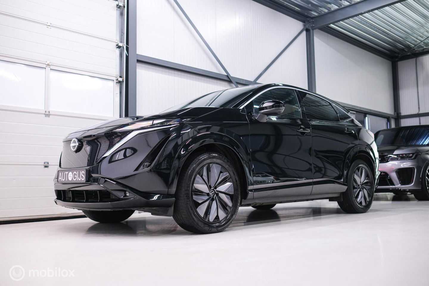 Nissan ARIYA Advance 66 kWh | 360 camera | navigatie | Halfleder | NAP NL auto | Rijklaarprijs | stoelverwarming |