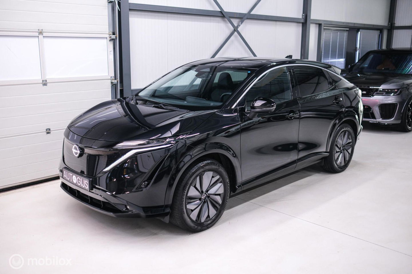 Nissan ARIYA Advance 66 kWh | 360 camera | navigatie | Halfleder | NAP NL auto | Rijklaarprijs | stoelverwarming |