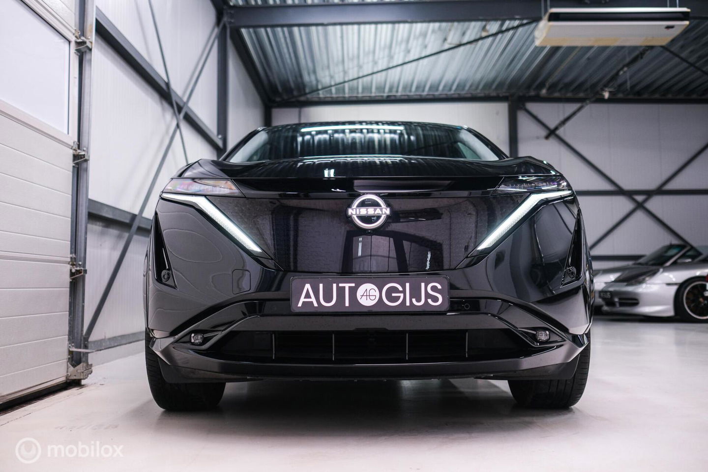 Nissan ARIYA Advance 66 kWh | 360 camera | navigatie | Halfleder | NAP NL auto | Rijklaarprijs | stoelverwarming |