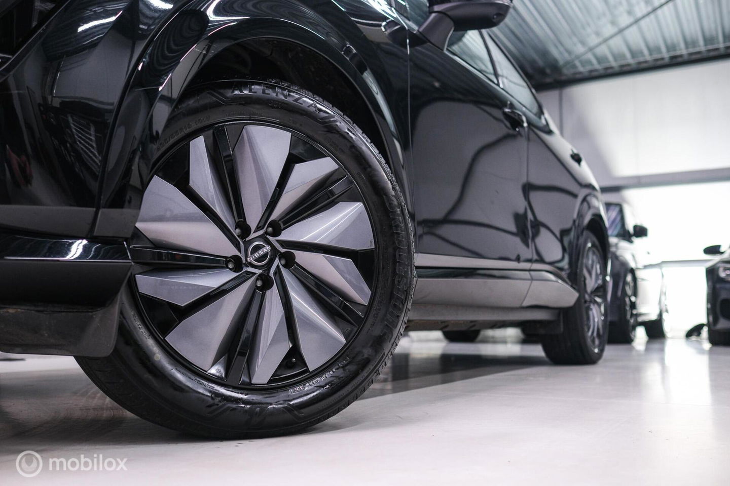 Nissan ARIYA Advance 66 kWh | 360 camera | navigatie | Halfleder | NAP NL auto | Rijklaarprijs | stoelverwarming |