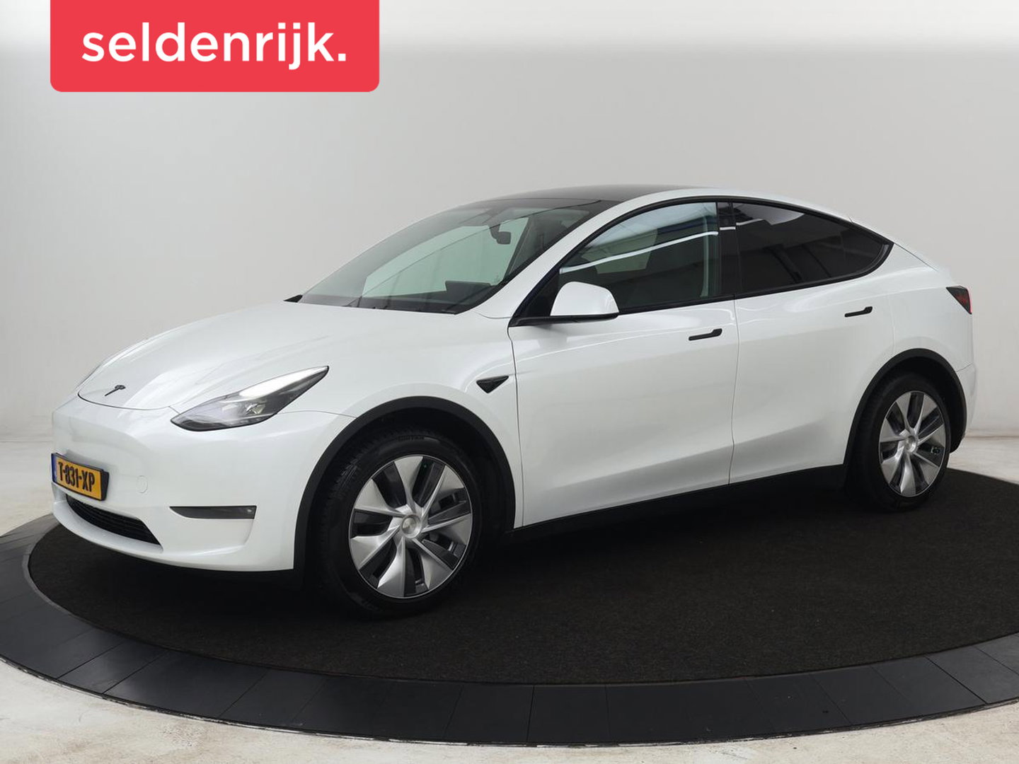Tesla Model Y Long Range AWD 75 kWh | SOH 94% | Panoramadak | Autopilot | Stoelverwarming | Leder | 360 Camera | Achterbankverwarming | Keyless | Navigatie | Full LED