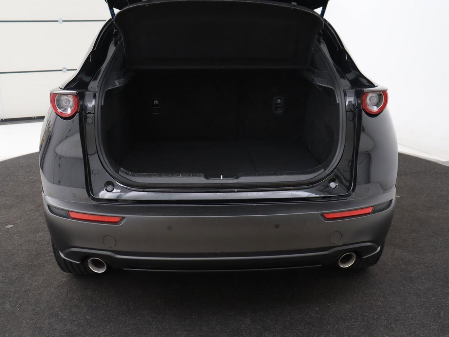 Mazda CX-30 2.0 e-SkyActiv-X M Hybrid Comfort | Stoelverwarming | Head-Up | Camera | Carplay | Adaptive cruise | Navigatie | Stuurverwarming | 18'' | Keyless | Full LED | Climate control