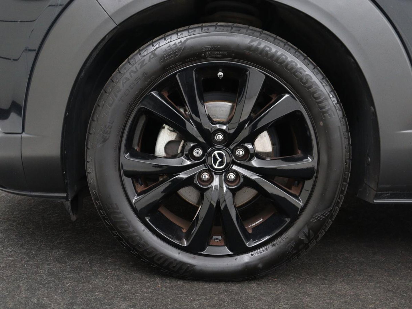 Mazda CX-30 2.0 e-SkyActiv-X M Hybrid Comfort | Stoelverwarming | Head-Up | Camera | Carplay | Adaptive cruise | Navigatie | Stuurverwarming | 18'' | Keyless | Full LED | Climate control