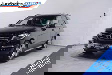 Mercedes-Benz M-Klasse - 350 BlueTEC luchtvering climate-controle lederen-bekleding voorstoelen electr met Memo cruise-controle Navigatie bleutooth schuifdak achterklep electrisch treeplanken PDC v+a 360-camera private-glas dakrails stoelverwarming schakelflippers aan het stuur