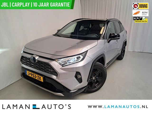 Toyota RAV4 - 2.5 Hybrid 218pk Bi-Tone | Alarm JBL CarPlay Halfleder Trekhaak ECC Nav 18" LMV ACC Camera Metallic | Hybrid Voorschoten
